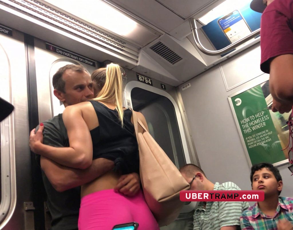Sporty girl politely hugs her friend in the train